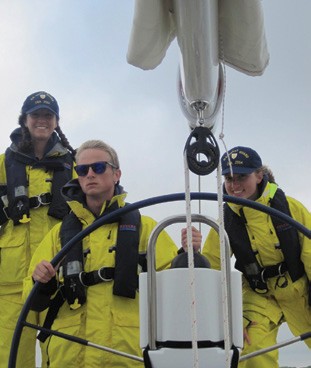 USCGA graduates (l – r) Alex Rennie, John Locke and Chelsea Sheehy, all from the class of 2014, are currently serving as U.S. Coast Guard officers. 