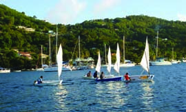 These sailors practicing on Admiralty Bay are just of few of more than 200 that have been through the Bequia Youth Sailors program. © bequiayouthsailors.org