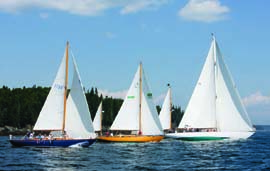 The Eggemoggin Reach Regatta fleet heads out to the start line. © Billy Black