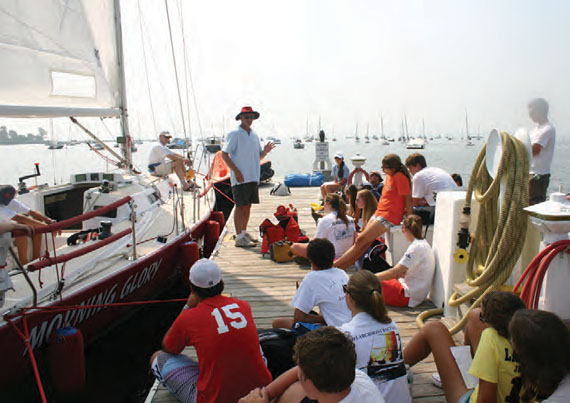 Safety at Sea Chairman Rich du Moulin works with junior sailors during one of many Junior Safety at Sea Seminars held by the Storm Trysail Foundation