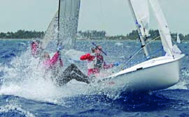 Wet ‘n wild conditions on the final day of the Lauderdale Olympic Classes Regatta provided some screaming downwind runs. © John Payne/johnpaynephoto.com