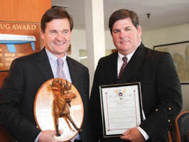 “Mark Rounding” and “Flint Stone” representing a yacht club in Connecticut, proudly display the Moosehead Fourth Class award. © Andrea Watson