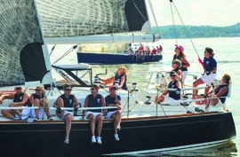 Participating in a charity regatta is an excellent way to get on a boat and make friends while supporting a worthy cause. Moonshine, a Tartan 4100 skippered by Linda Ziemba, competed in the 2012 Ms. Race. This all-female regatta, hosted by Atlantic Highlands Yacht Club, supports 180 Turning Lives Around’s mission to end domestic violence and sexual assault. © Jeff Smith/njphoto.net