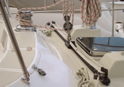This seriously poor lead of the mainsheet, again on a name brand yacht, is just nuts. The capacity for the traveler car to slide is limited by the radius of the distance between the car and the winch. Functionally when going upwind, the traveler is NOT adjustable.