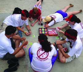 The Ship 6 crew played Apples to Apples during the all-too-frequent postponements at a very foggy Race Week. © norwalkship6.org