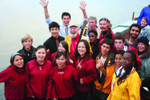 Pete Seeger (1919 - 2014) touched countless lives through his music, his kindness, and his work towards a better, more just world. He’s pictured here the deck of the sloop Clearwater with Inuit students from Uummannaq, Greenland in 2010. © Chris Bowser