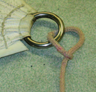Another way to make the sheet/clew bulk smaller is to lash the sheet to the ring with multiple passes of smaller cordage.