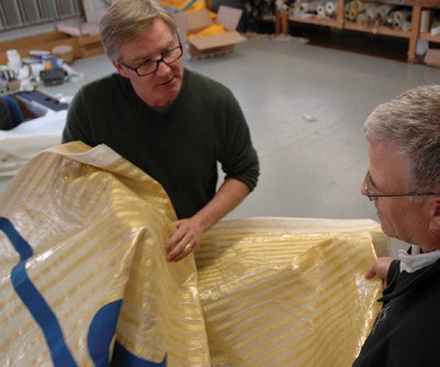 UK Sailmakers New York loft owner Dave Coughlin (left) discusses sailcloth with Tom D’Albora of Dimension-Polyant. 