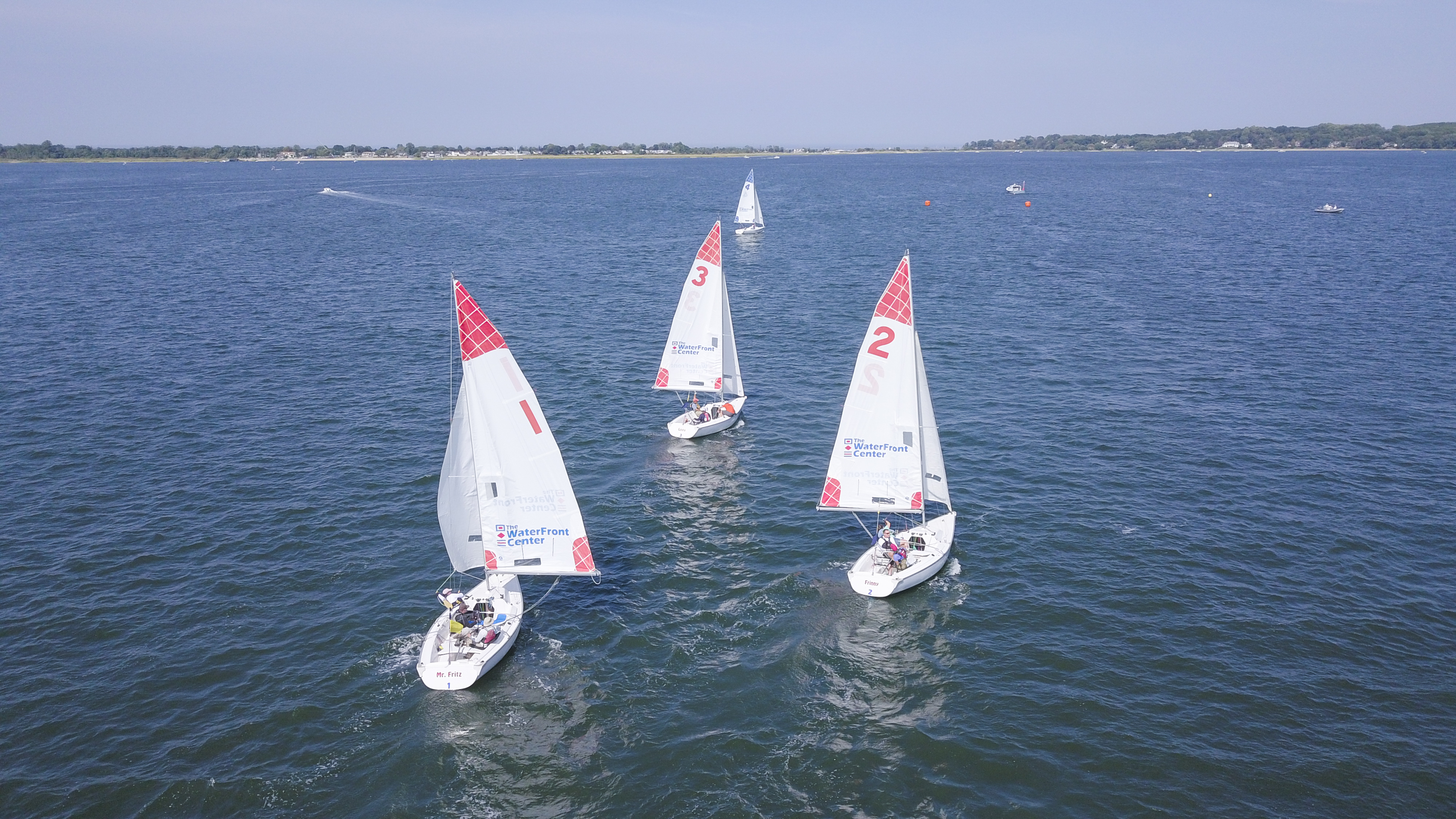 Third time’s the charm for winners of the fourth Clagett/Oakcliff Match Racing Clinic and Regatta